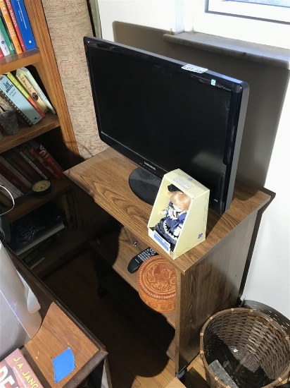 Small Samsung TV, remote, doll, stand