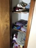 Contents of hall closet, towels, medical