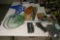 Contents of table top including fishing lures, reels etc