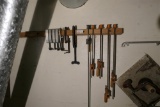Group Lot of Clamps on wooden bar