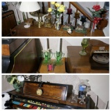 Assorted items on piano, organ, stand - glass etc