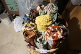 Bundle of small woven mats or rugs in basket