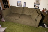 Plush upholstered couch by Arhaus