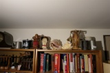 Items on top of shelves not including clock