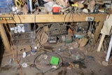 Misc items under work bench inc air compressor