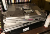 Stack of assorted vintage laptop computers