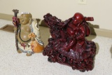 2 decorative buddhist figures including ceramic