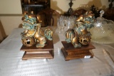 Foo dogs on wooden display pedestals