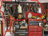 Large lot assorted tools on wall
