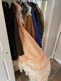 Closet of clothing including Large Costume Dress, military