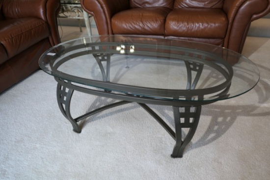 Glass top coffee table with metal base