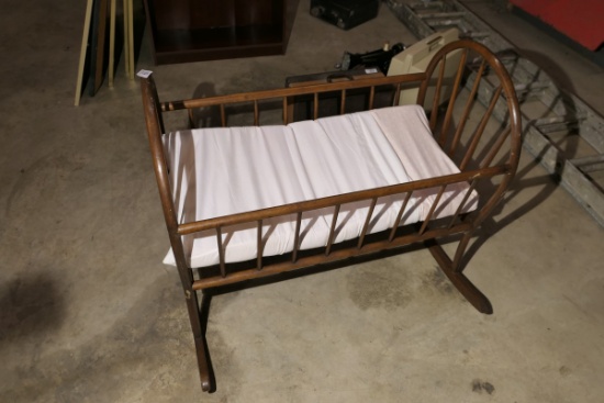 Vintage wooden rocking baby cradle