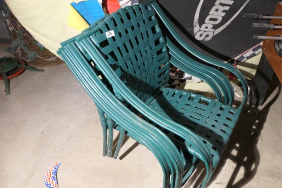 Stack of vintage lawn or patio chairs