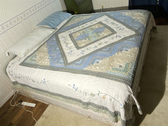 Queen sized bed with boxspring, bedspread