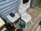 Cast metal patio or garden chair and table