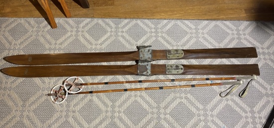 Pair of antique wooden skis plus poles