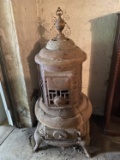 Large old antique pot belly stove