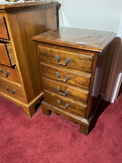 Small wooden cabinet with drawers