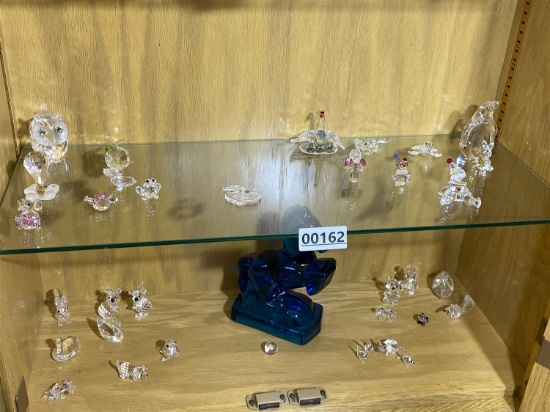 Large lot of assorted Swarovski Crystal figurines