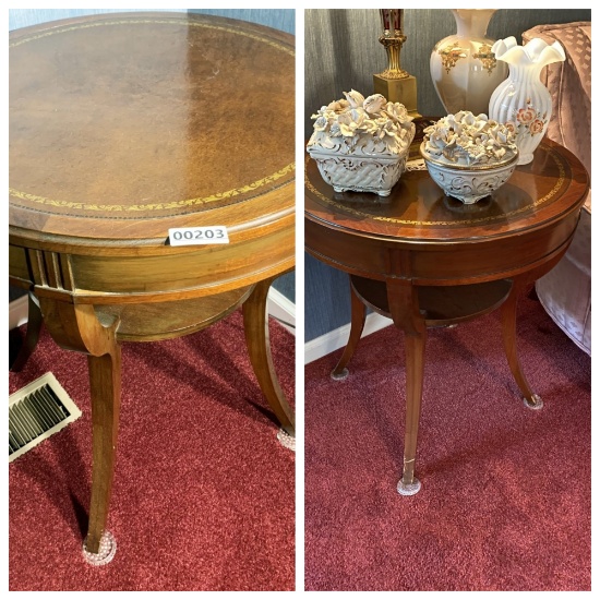 Pair of leather topped matching lamp tables