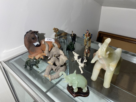 Group of carved animals including ceramic, jade etc