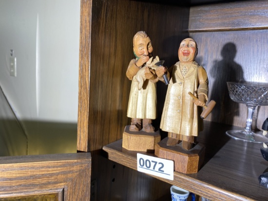 Pair of whimsical carved occupational figures