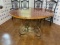 Vintage Round Dinner Table with Fancy Metal Base