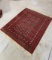 Vintage red Persian hand woven rug or carpet