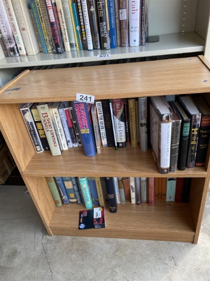 Two shelves of assorted books - Plus shelf