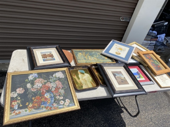 Table lot of assorted framed art, Coca Cola trays, paintings
