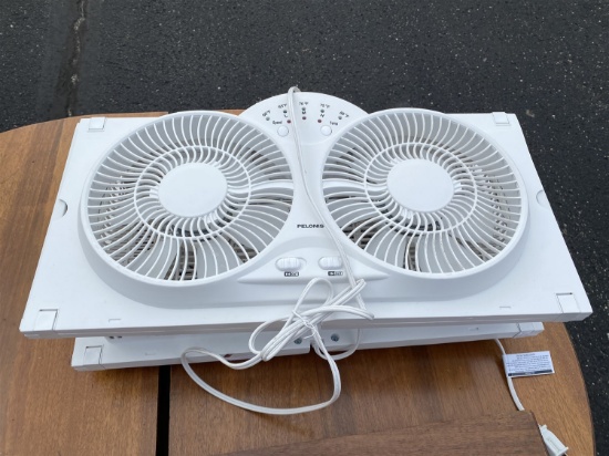 Pair of window fans with thermostat control