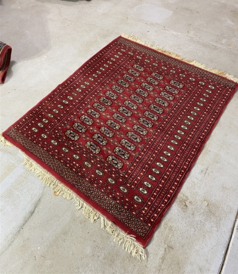 Vintage red Persian hand woven rug or carpet