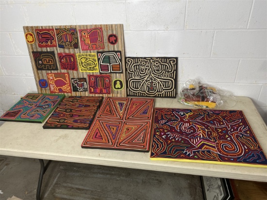 Group lot of woven Mola textiles in frames