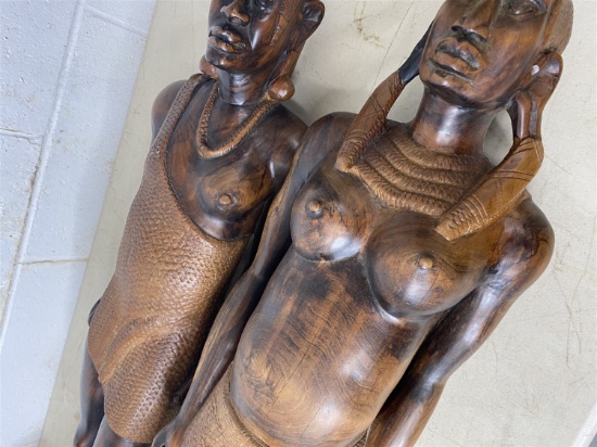 Pair of tall finely carved African tribal women statues