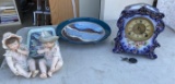 Antique blue ceramic clock, 2 porcelain babies etc