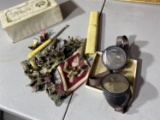 Old goggles, button hook, patch, metal clips, candy box