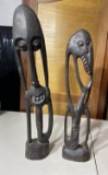 Pair of bizarre and beautiful African carved wood art statues