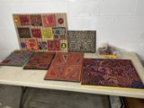 Group lot of woven Mola textiles in frames