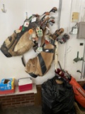Three sets of vintage golf clubs w/many course tags