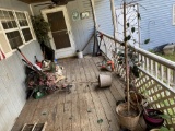 Contents of items on the porch including edger