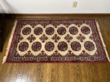 Small persian style rug measing