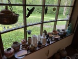 Large lot of assorted glass, art pottery and more in the window