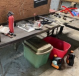 Lot of assorted garage items on table