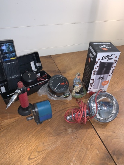 Cast Iron Door Stop, Realistic Emergency CB Radio, Honda Tachometer and Pencil Sharpener