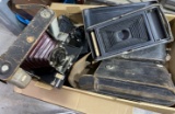 Assortment of antique cameras including Kodak Automatic