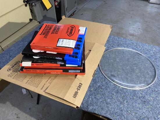 Group lot of drum heads in Evans Boxes