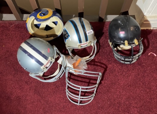 Group lot of four vintage football helmets including NFL