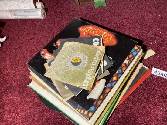 Stack of vintage records and sleeves