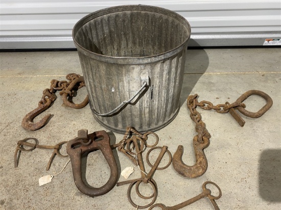 Metal garbage can with clovis, hooks, chains etc
