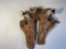 Pair of vintage toy old west pistols and holsters